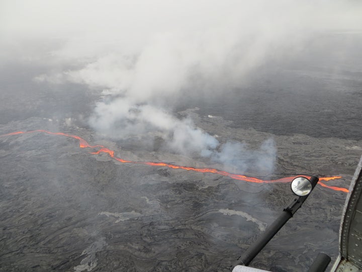 This May 25 USGS photo shows the northern breakout feeding an impressive channel of lava that extended about 0.6 mi northwest of the cone.