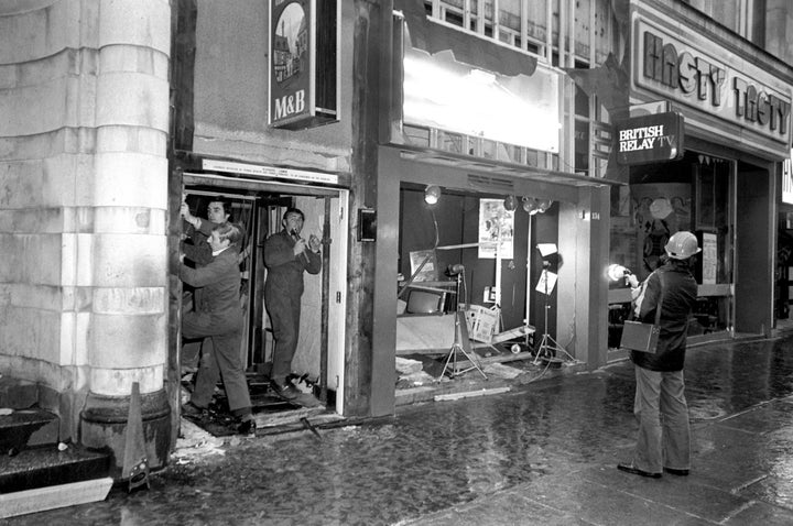 The damaged front of the Tavern in the Town