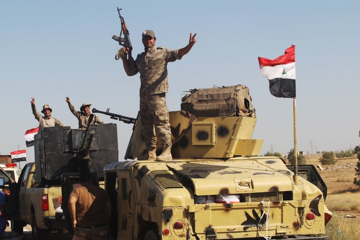 With 50,000 civilians still believed trapped inside Fallujah, the United Nations has warned that militants are holding hundre