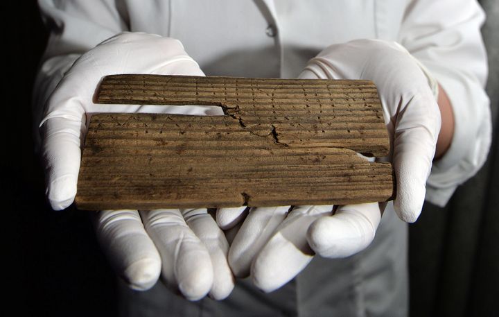 A piece of wood with the Roman alphabet written on it in AD 60/62