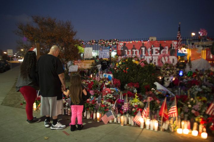People visit a memorial in San Bernardino, California, near the site of the Dec. 2, 2015, massacre. The city has experienced a spike in murders this year.