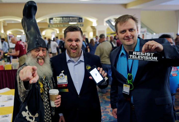 At least, Vermin Supreme (left) and others seemed to enjoy themselves at the Libertarians' convention.