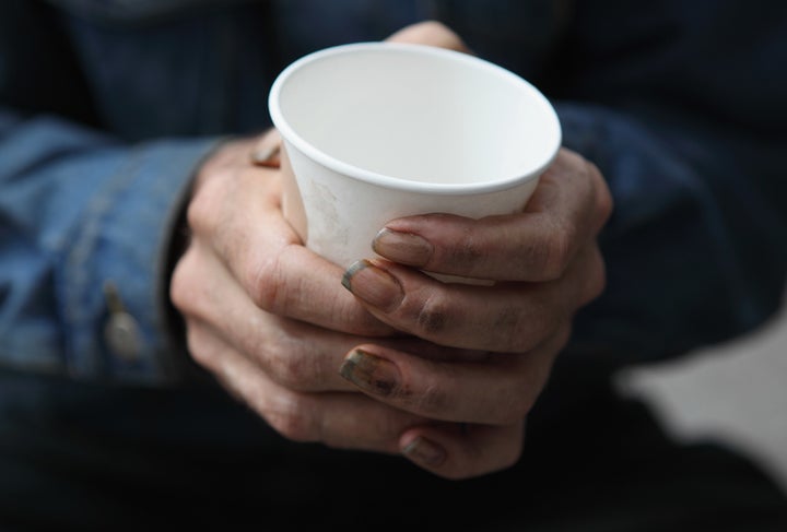 SAN FRANCISCO - SEPTEMBER 16: A homeless man holds a cup as he begs panhandles for spare change on September 16, 2010 in San Francisco, California. The U.S. poverty rate increased to a 14.3 percent in 2009, the highest level since 1994. (Photo by Justin Sullivan/Getty Images)