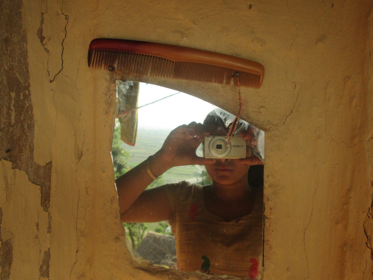 In some regions, when girls get their first period, they're not allowed to look into mirrors or comb their hair.