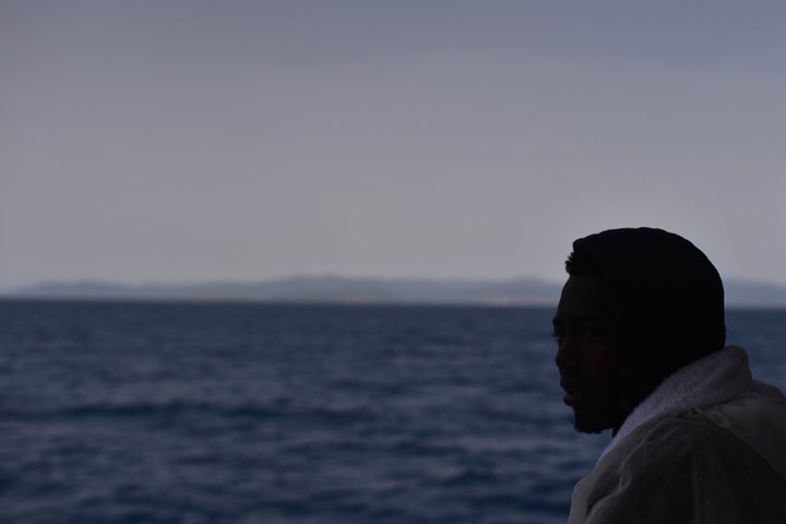 Hundreds of migrants were rescued from a sinking ship on Friday. Four bodies were also recovered.