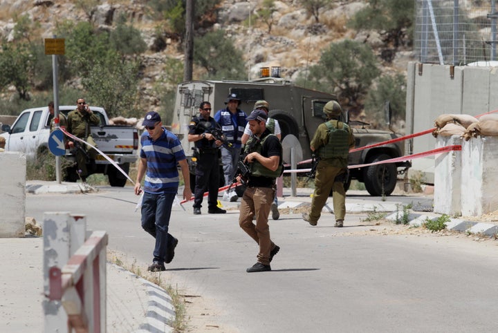 The French president said upheaval in the Middle East makes Israeli-Palestinian peace even more urgent. Above, Israeli s