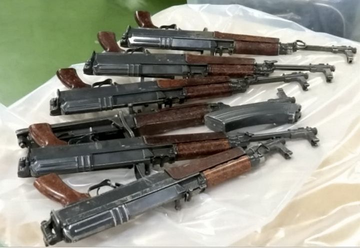 Some of the seized assault rifles