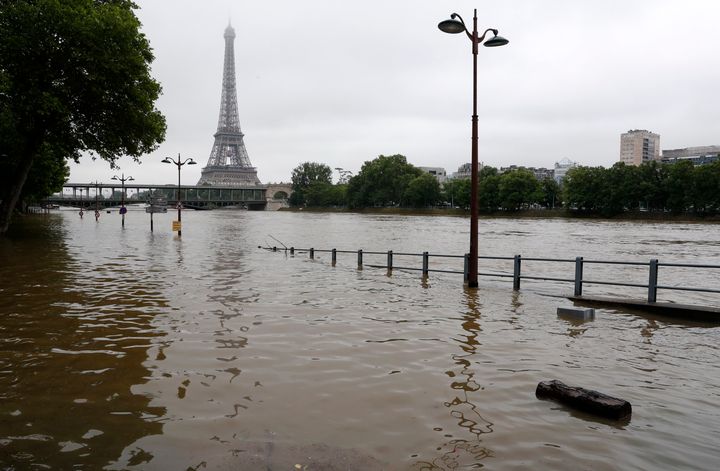 View of the flooded Seine near the Eiffel Tower in Paris on June 3, 2016, after days of almost nonstop rain. 