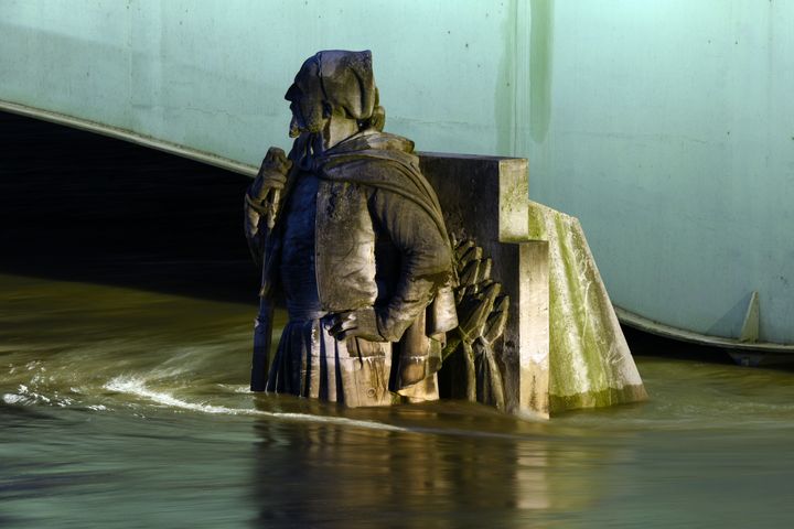 The Zouave statue of the Alma bridge flooded by the river