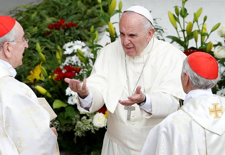 Pope Francis gestures as he is greeted by Cardinals at the end of a mass for the Jubilee of Priests at St. Peter's Square at the Vatican June 3, 2016.