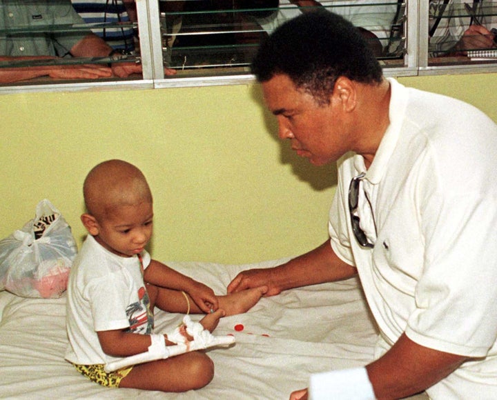 Muhammad Ali visits a pediatric hospital in Havana during his trip to Cuba on a humanitarian mission.