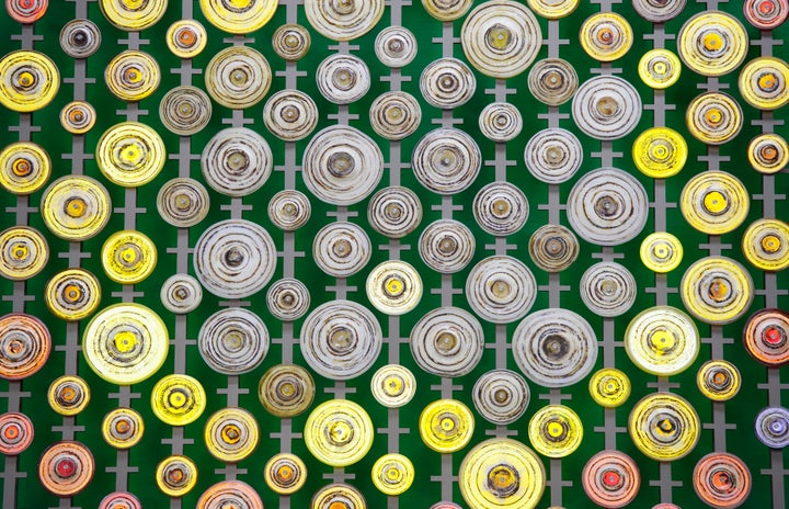 The circular scrolls combine with the metal portcullis to create 168 distinct ‘Venus’ symbols, representing the women who fought for their right to vote.