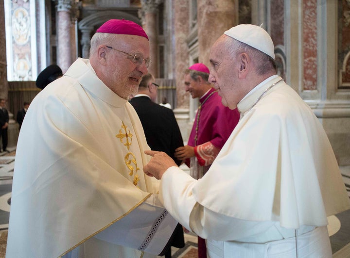 Pope Francis meets Bishop of Stockholm, Anders Arborelius (L) before he leads the mass for the canonization of Swedish nun Sister Maria Elisabeth Hesselblad and Polish priest Father Stanislaus of Jesus and Mary in Saint Peter's Square at the Vatican June 5, 2016.