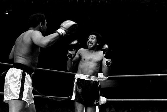 Richard Pryor appears scared to death as he is shown facing Muhammad Ali in a benefit fight at the Olympic Auditorium, Los An