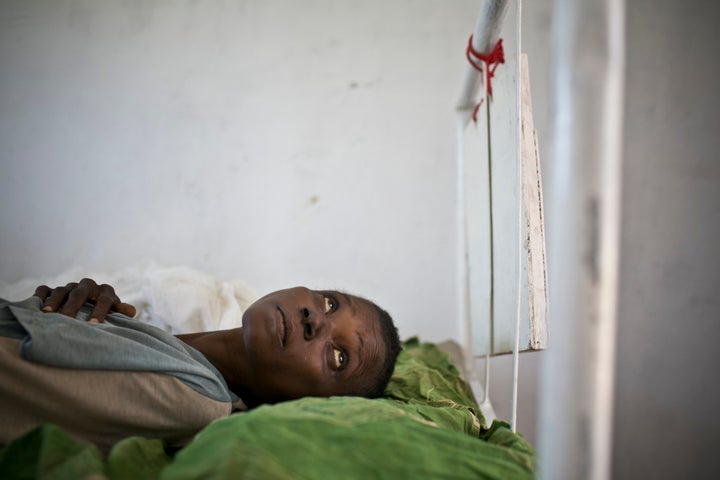 A woman who was co-infected with tuberculosis and HIV is hospitalized in the TB ward operating under MSF-France in Carnot Hos