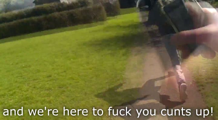 A still from the video shows the confronted man running away as he's told National Action are 'here to fuck you cunts up'