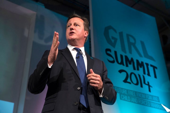 <strong>David Cameron addressing the Girl Summit 2014, when he pledged to make it compulsory for teachers and health workers to report cases of FGM</strong>