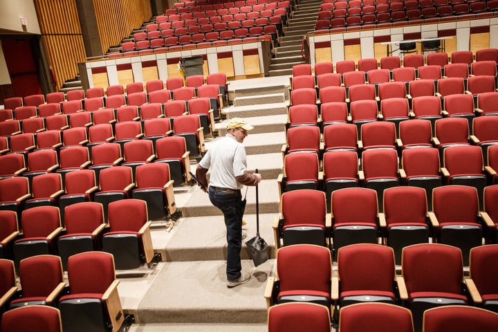 Vautour cleans the Robsham Theater. 