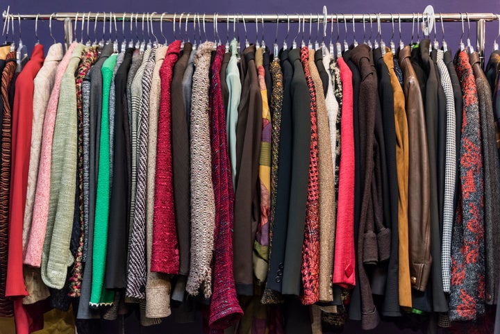 Women's jacket selection in a thrift shop.