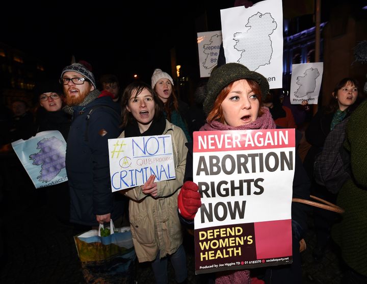 The United Nations said Thursday that an Irish woman who had to choose between carrying her dying fetus to term or going abroad for an abortion had her rights violated. Pictured here, pro-choice campaigners take part in a demonstration through Belfast in January.