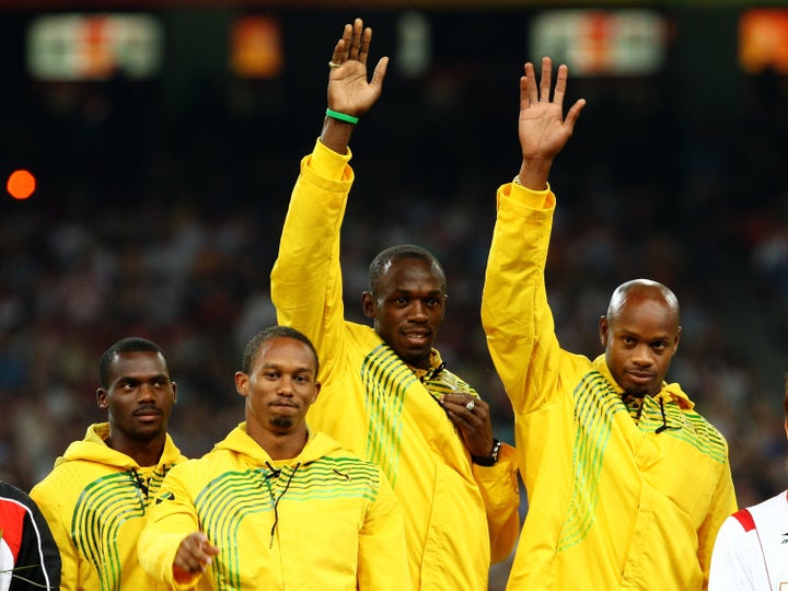 Nesta Carter, pictured left when the Jamaican team received its gold medals for winning the 4 X 100 meter relay at the Beijin