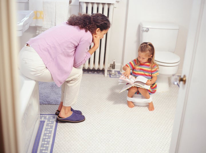 Mother potty training daughter