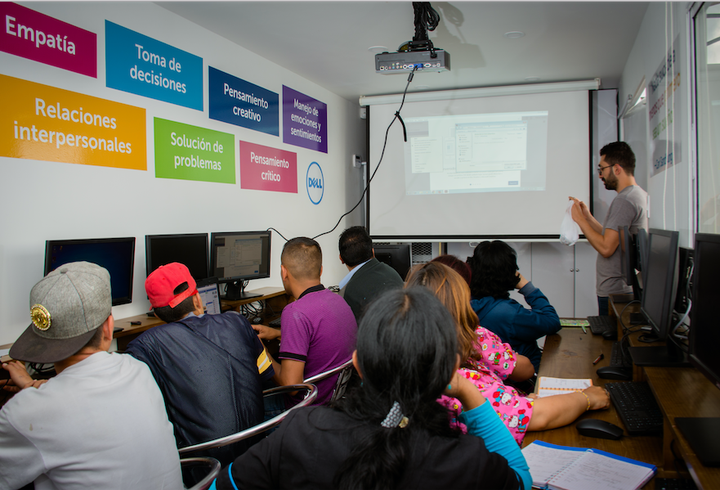 A teacher gives a lesson inside the lab.