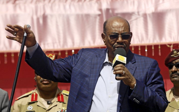 Sudanese President Omar Bashir, who is wanted by the International Criminal Court for war crimes and crimes against humanity, is pictured in North Darfur in April.