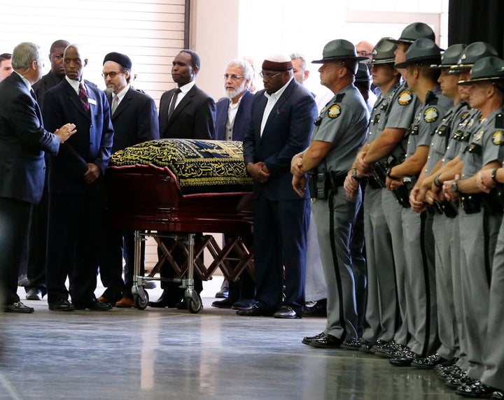 The coffin of late boxing champion Muhammad Ali arrives for a jenazah, an Islamic funeral prayer, in Louisville, Kentucky, U.