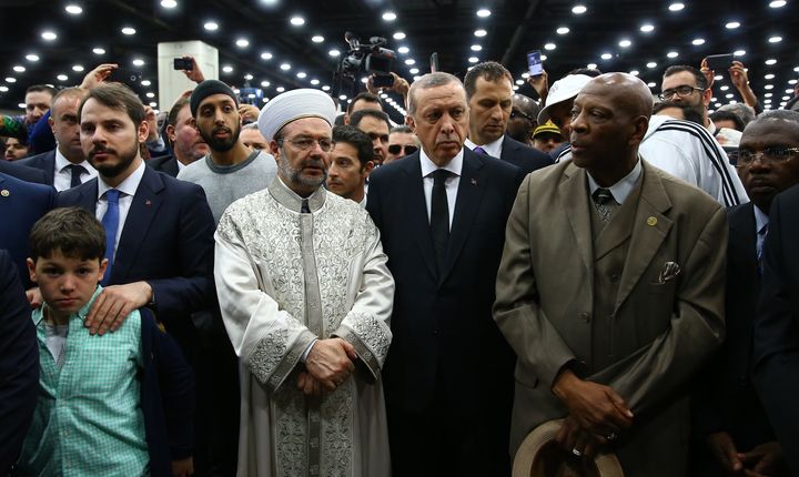 Turkish President Recep Tayyip Erdogan, Turkish Minister of Energy and Natural Resources Berat Albayrak and Mehmet Gormez, the head of Turkey's Religious Affairs Directorate attend the Islamic prayer service for Muhammad Ali.