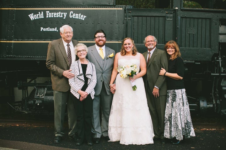 Ariane with her grandparents, husband, dad number two and her stepmom at her wedding in 2014.