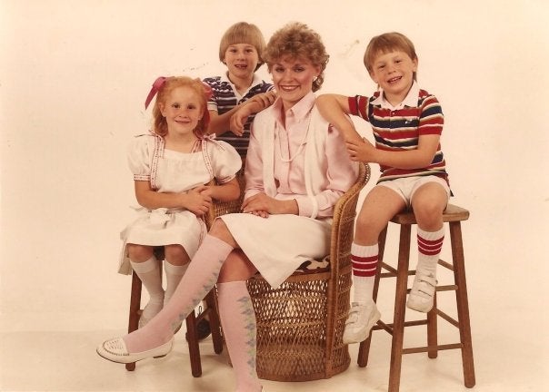 Ariane with her mom and brothers.