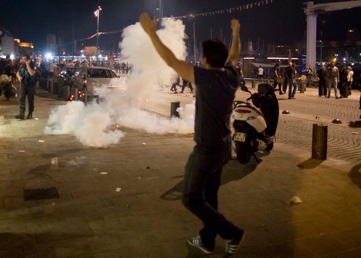 Police fired tear gas after trouble flared outside an Irish pub