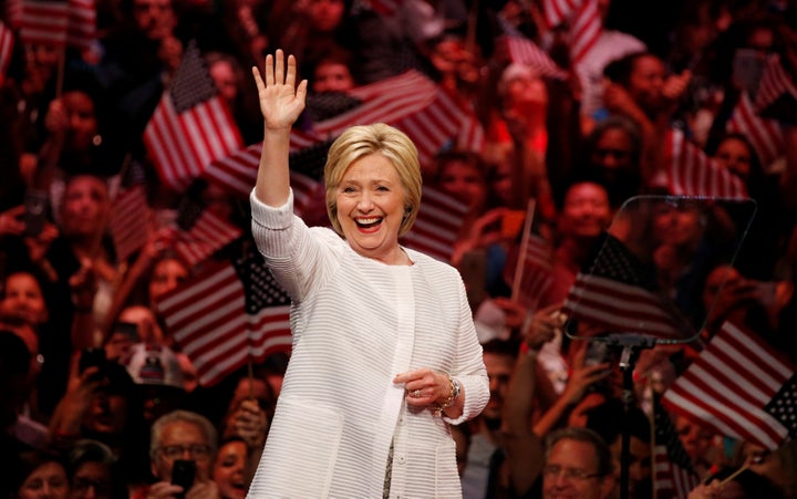 Democratic U.S. presidential candidate Hillary Clinton waves as she arrives to speak during her California primary night rally held in the Brooklyn borough of New York, U.S., June 7, 2016.