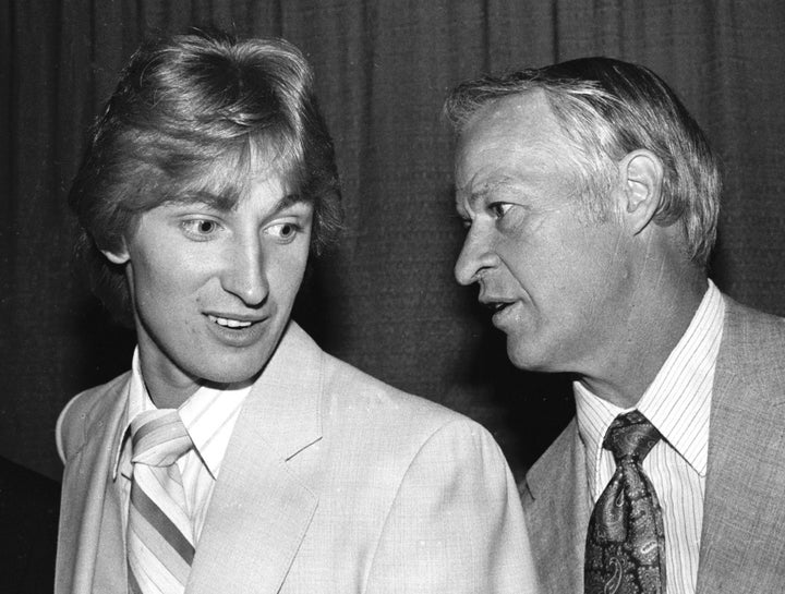 Wayne Gretzky and Gordie Howe at a reception for the latter the day after he retired from the NHL in 