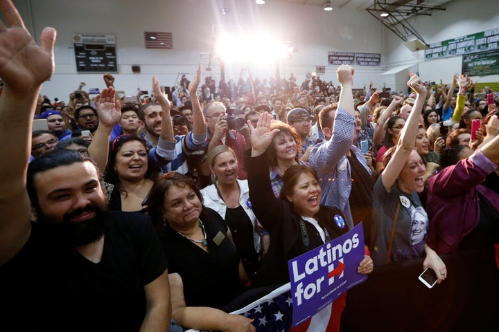 Supporters cheer as Democratic presidential candidate Hillary Clinton speaks on Cinco de Mayo in Los Angeles.