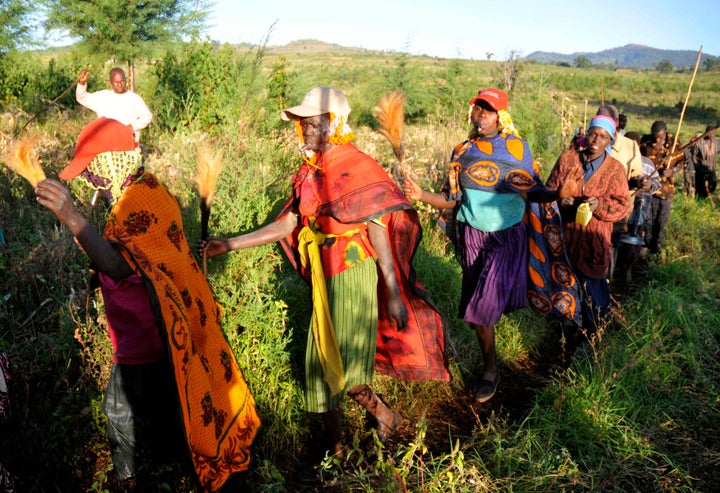 Teenage girls from Uganda's Sebei tribe take part in a procession before undergoing female genital mutilation in Bukwa district, about 357 kms (214 miles) northeast of Kampala, December 15, 2008. The ceremony was to initiate the teenagers into womanhood according to Sebei traditional rites. REUTERS/James Akena (UGANDA)