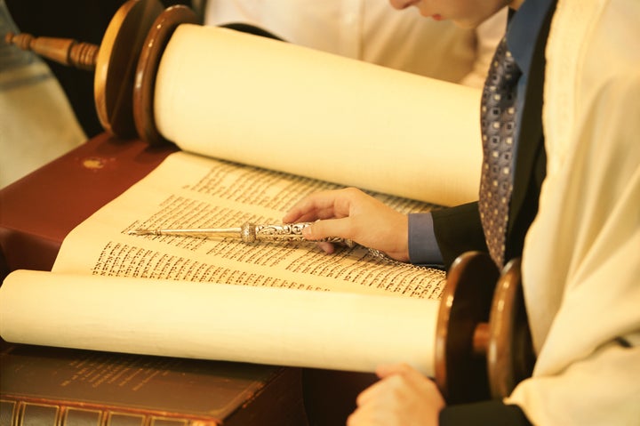 The Torah is an ancient Jewish text that is a central part of the faith.