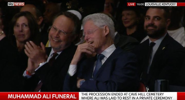 <strong>Bill Clinton (right) was caught on camera smiling as he spoke to actor Billy Crystal during the ceremony.</strong>