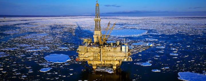 An oil production platform is pictured in icy water, in Cook Inlet, Trading Bay, Alaska.