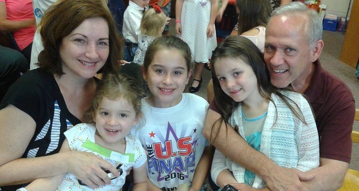 Joanne and Steve Bryant with their granddaughters.