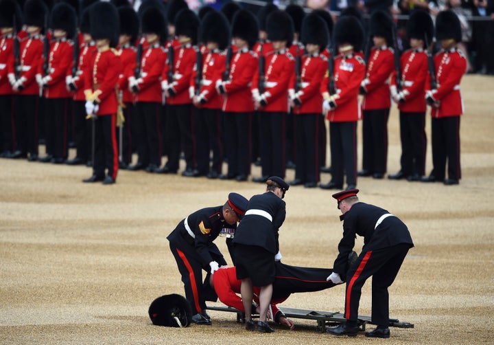 The soldier is stretchered away