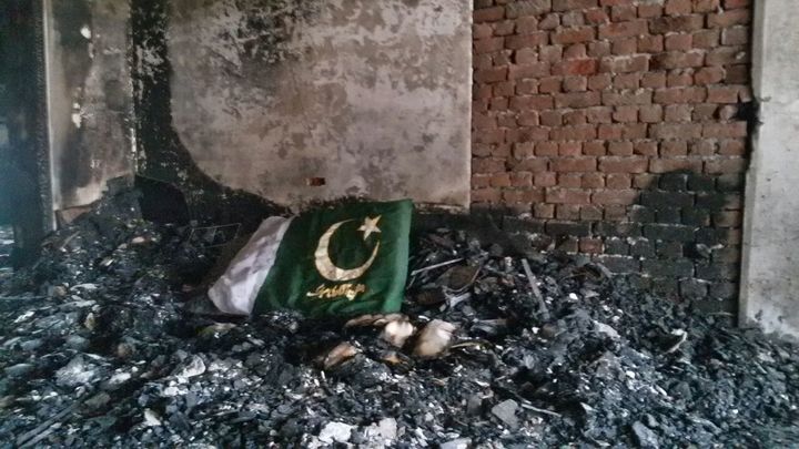 An Ahmadi house burnt down by an angry mob on allegations of blasphemy in November last year
