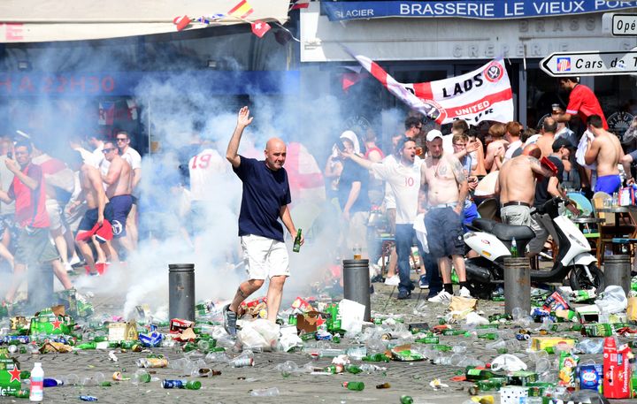 Tear gas is fired at England fans as they gather in the city of Marseille, southern France, on June 11, 2016, ahead of the Euro 2016 football match between England and Russia.