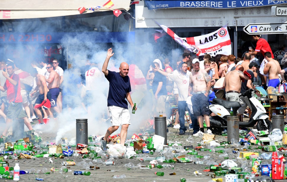 Tear gas is fired at England fans as they gather in the city of Marseille, southern France, on June 11, 2016, ahead of the Eu