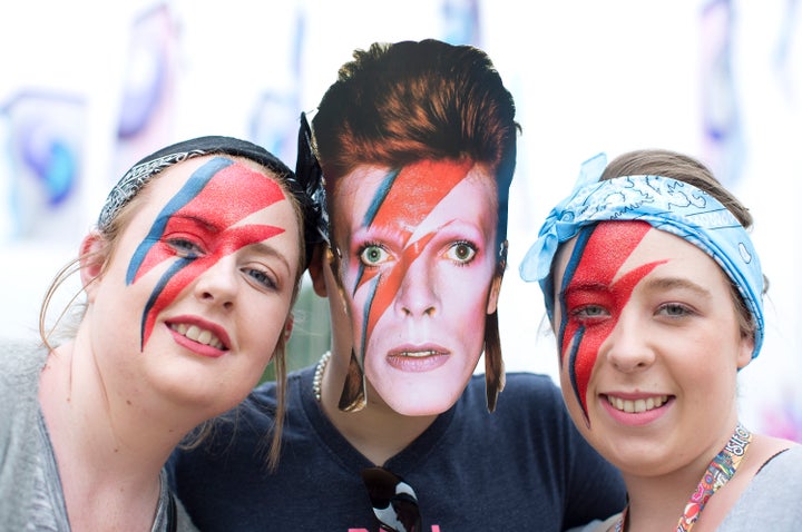 <strong>The tribute began with a message from comedian Jack Whitehall and involved festival-goers singing along to Heroes, Rebel Rebel and All The Young Dudes</strong>