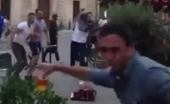 <strong>A triumphant drinker retreats from the scene with his pint still in tact</strong>