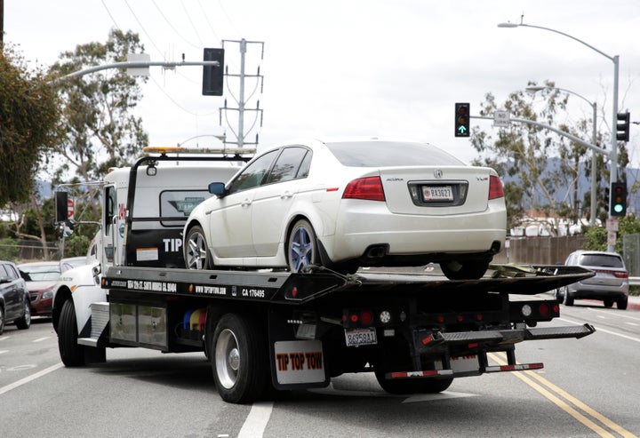 A vehicle that reportedly belonged to James Wesley Howell is towed in Santa Monica, California, on Sunday.