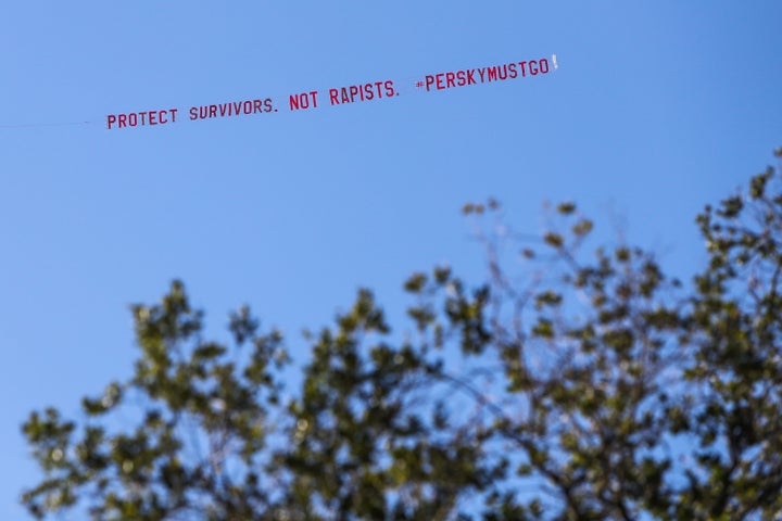 A plane flies over Stanford University with a banner reading 'Protect Survivors. Not Rapists. #PerskyMustGo' during the commencement ceremony at Stanford University, in Palo Alto, California, on June 12, 2016.