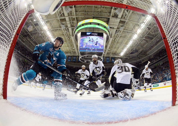 San Jose Sharks center Logan Couture (39) reacts after scoring a goal past Pittsburgh Penguins goalie Matt Murray (30) i